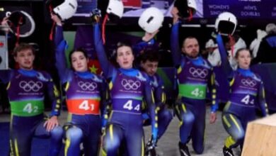 Barred Ukrainian aims to race for gold in commemorative helmet
