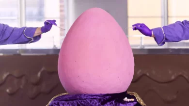 A giant pastel pink chocolate egg on display at the Cadbury World visitor attraction.