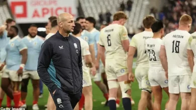 Sir Clive Woodward speaking at a press conference.