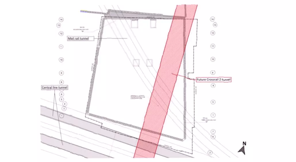 Diagram of deep underground railway tunnels beneath city foundations.