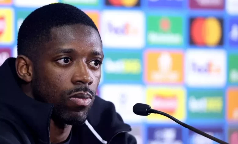 Ousmane Dembélé in action for PSG during a Champions League match.