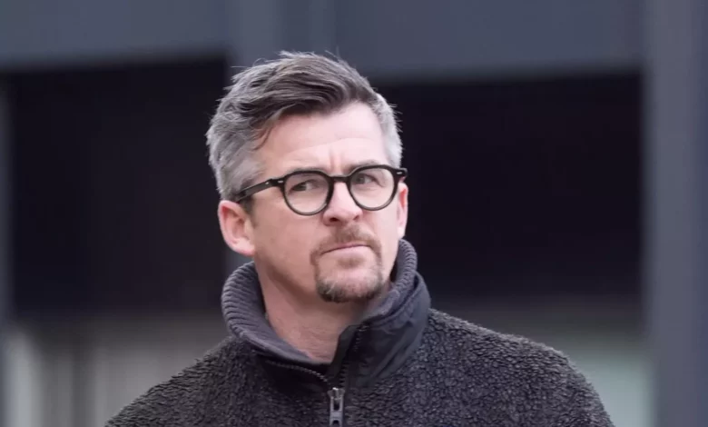 Joey Barton appears via videolink at Liverpool Crown Court.