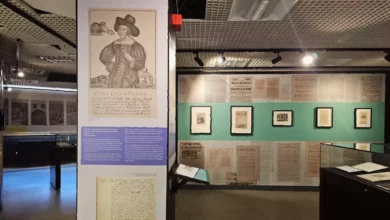 Display case showing historical court documents from the London Archives.