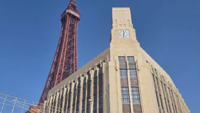 Art Deco building on a street corner in Blackpool with a prominent clock tower.