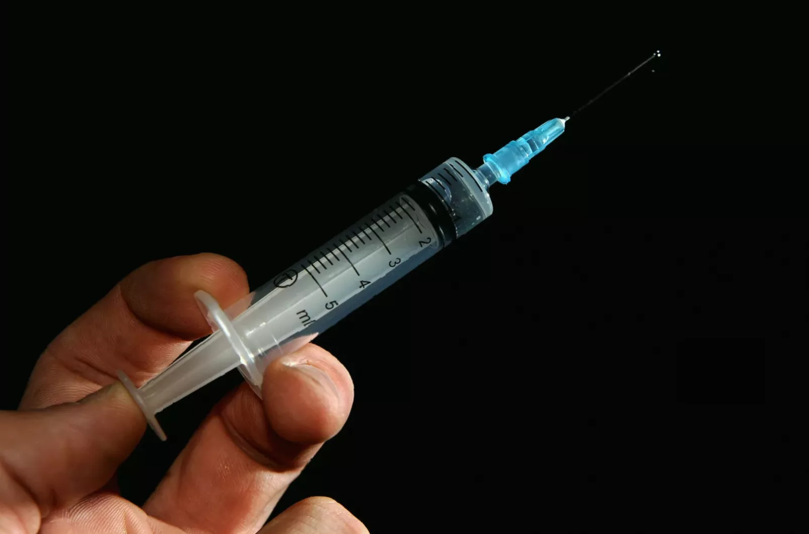 Close-up of a medical professional safely administering a dermal filler injection.