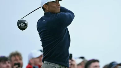 A professional golfer's car on its side after a road traffic collision.