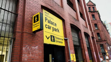 Aerial view of a multi-storey NCP car park in a UK city centre.