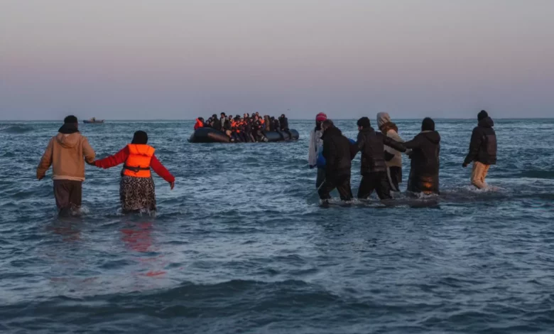A heavily crowded inflatable dinghy crosses the English Channel.