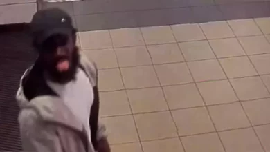 CCTV view of a London Underground station platform.