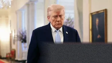 Donald Trump speaking at a podium with a presidential seal.