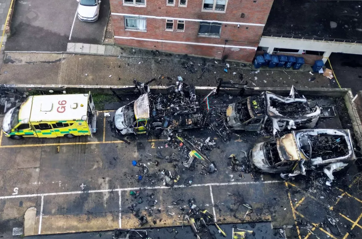 Police cordon and forensic officers at the arson scene on Highfield Road.