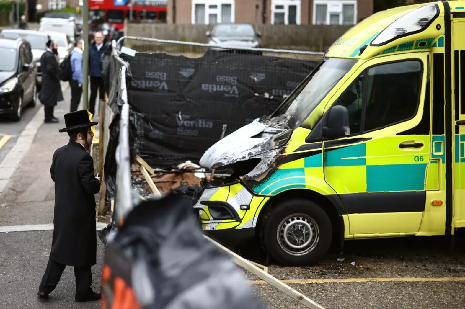 Counter-terrorism police vehicle outside a residential address during an arrest.