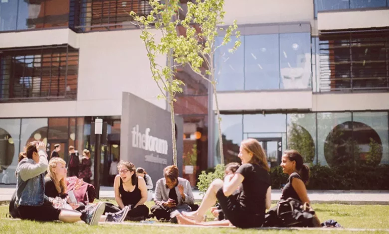 Lecturers discussing the redundancy notices at the University of Essex.