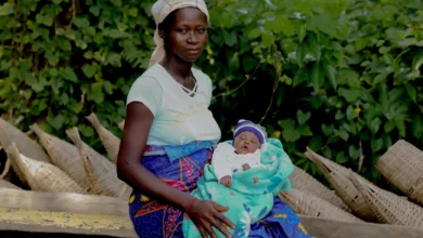 A health center in Zambia where a mother prepares for childbirth without clean water.