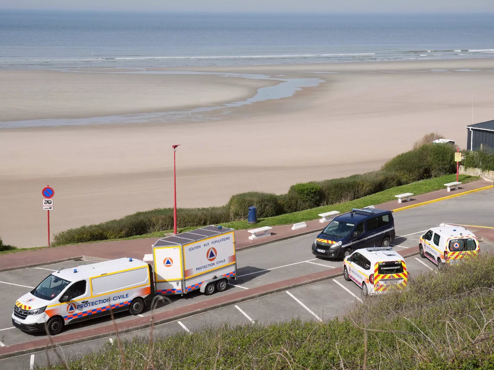 Emergency services responding to an incident on a French coastline.