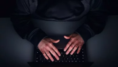 Analysts at the Internet Watch Foundation review flagged AI-generated content on screens