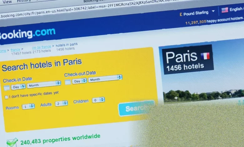 Laptop screen displaying a travel booking website with a security warning notification.