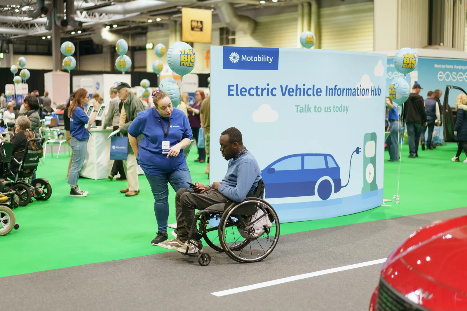 A disabled driver using a Motability vehicle for essential travel.