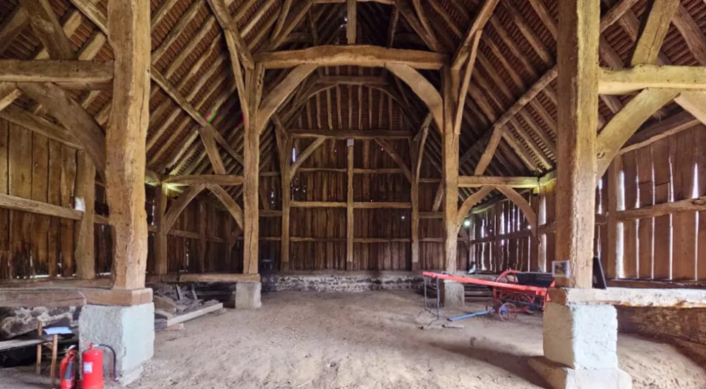The barn's setting at the end of a narrow lane near Heathrow Airport
