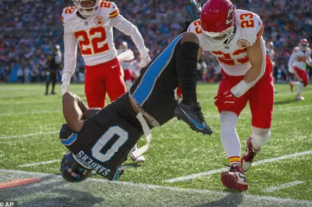 American football contract negotiation and salary cap discussion.