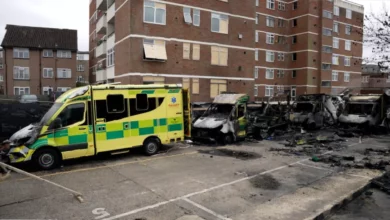 Burnt-out wreckage of emergency ambulances in a synagogue car park.
