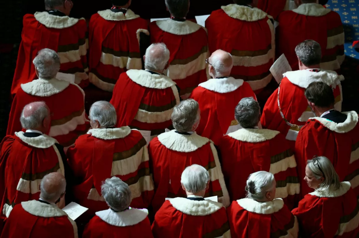 Black Rod leading MPs from the Commons to the upper chamber