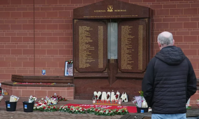A sombre football stadium on an anniversary of a major disaster.