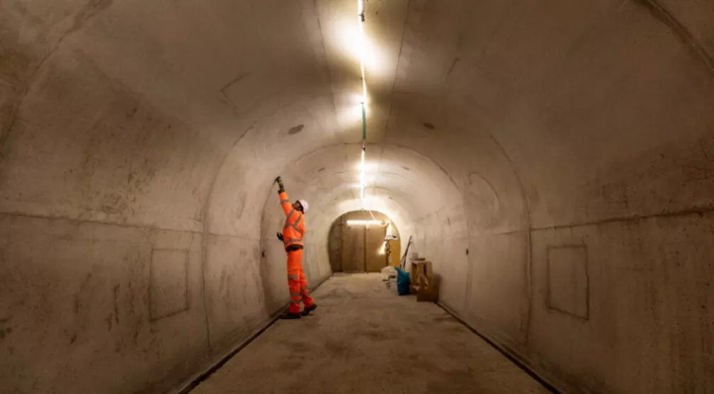 Ground freezing pipes inserted into tunnel lining to stabilise water-bearing soil before excavation