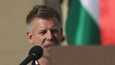 Crowds gather at a final election rally in a Hungarian town square.