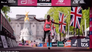 Runners cross Tower Bridge during the 2025 London Marathon route