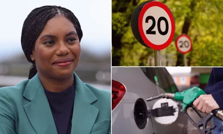 A UK residential street with a 20mph speed limit sign and a car passing by