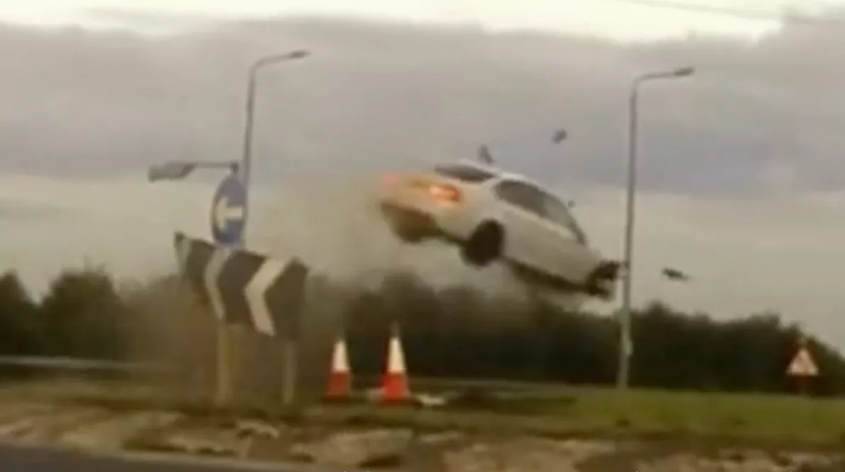 A white BMW involved in a high-speed pursuit on a motorway.