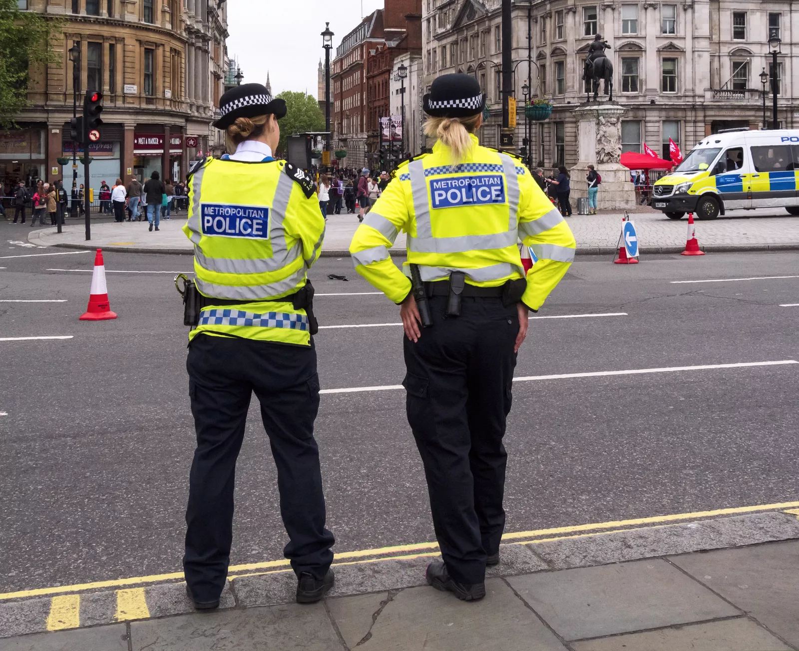 A Downing Street security guard standing beside the main entrance to Number 10
