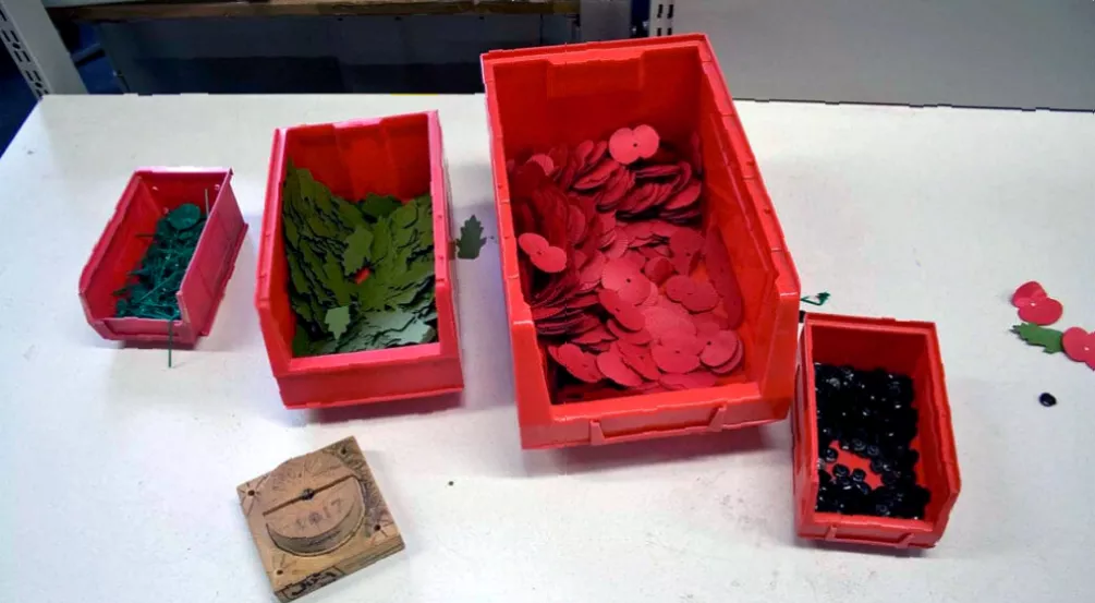 Inside the factory workshop where remembrance wreath poppies are hand-assembled.