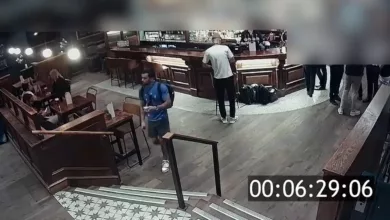 Thieves targeting unattended bags in a busy London pub bar area.