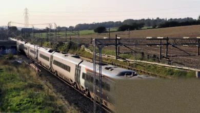 A high-speed train on a section of new HS2 railway track.