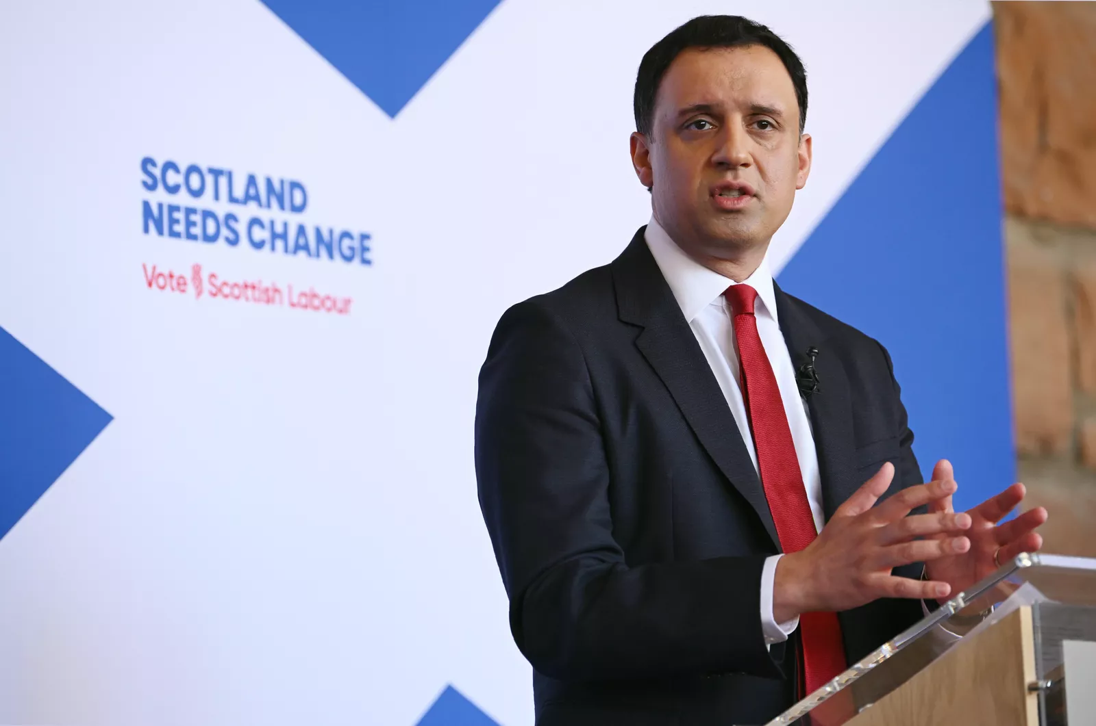 Election campaign graphics showing projected Holyrood seat numbers.