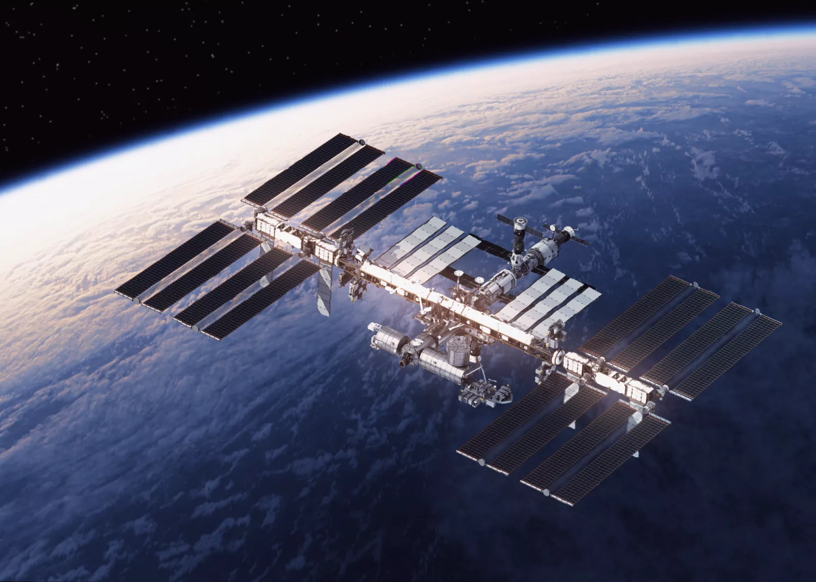 A cluster of low-Earth-orbit satellites orbiting above a blue planet Earth.
