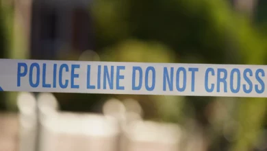 Police cordon on a residential street in Woolwich following a shooting.