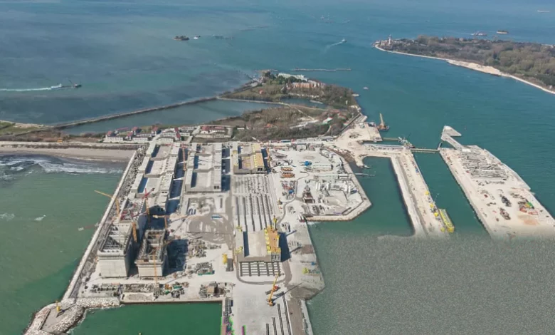 Aerial view of Venice's lagoon with flood defence barriers visible.