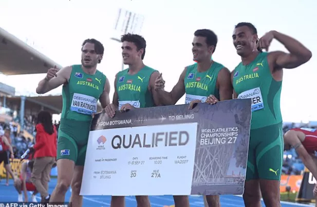 Australian relay team crossing the finish line with a record-breaking time
