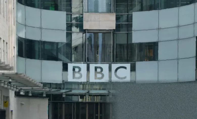 BBC staff gathered in a meeting room for an all-staff briefing on job cuts