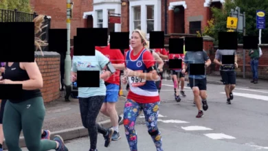 Woman in gym leggings taking part in a high-intensity Zumba class