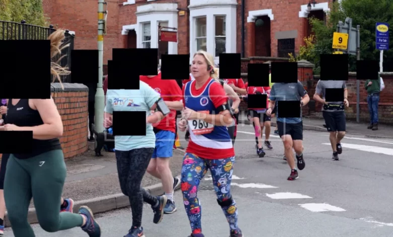 Woman in gym leggings taking part in a high-intensity Zumba class