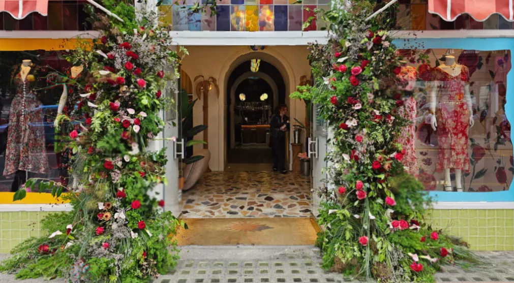 A large floral UFO suspended above a pedestrian street in Pavilion Road