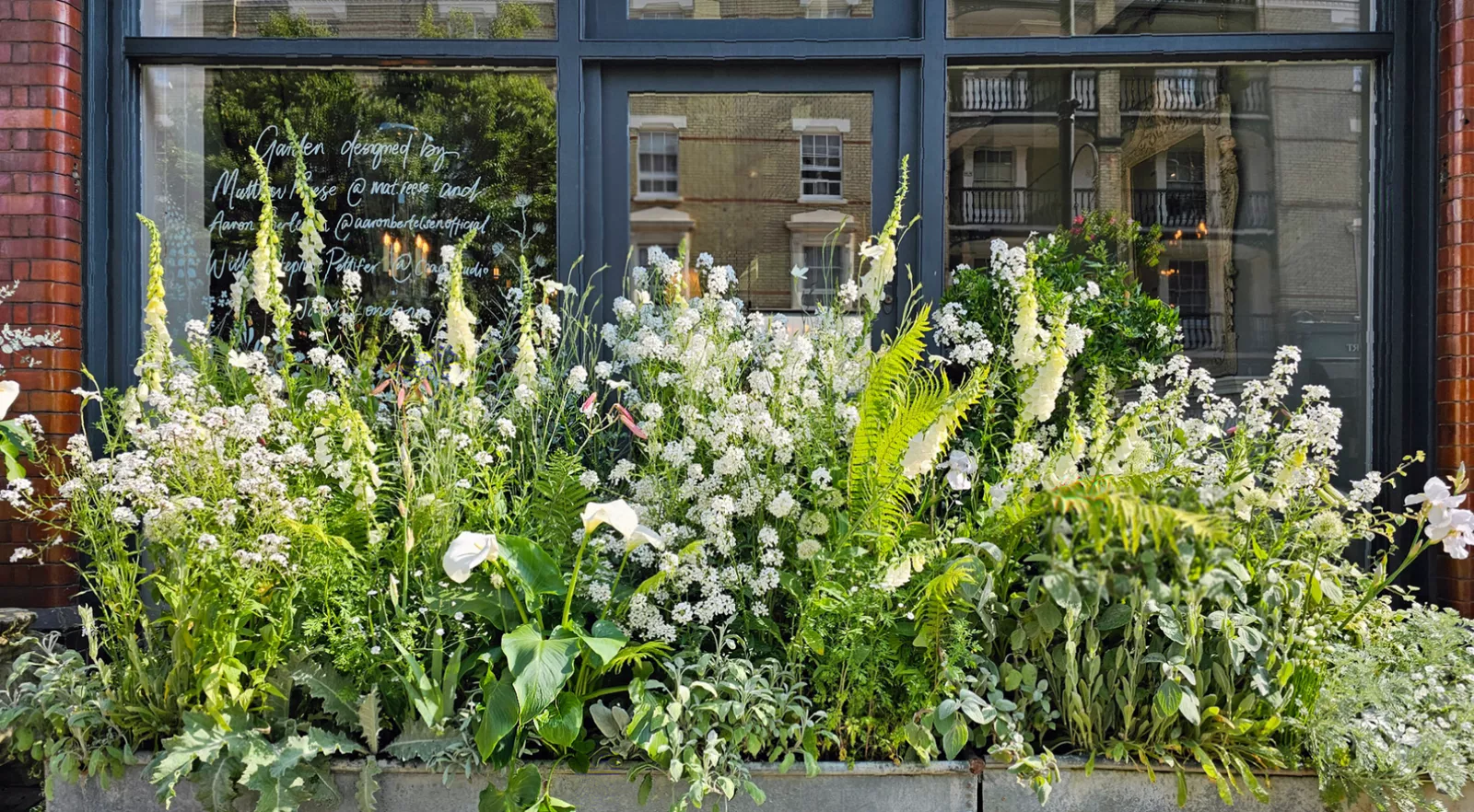 Flowerbeds and window displays depicting the four seasons in Belgravia