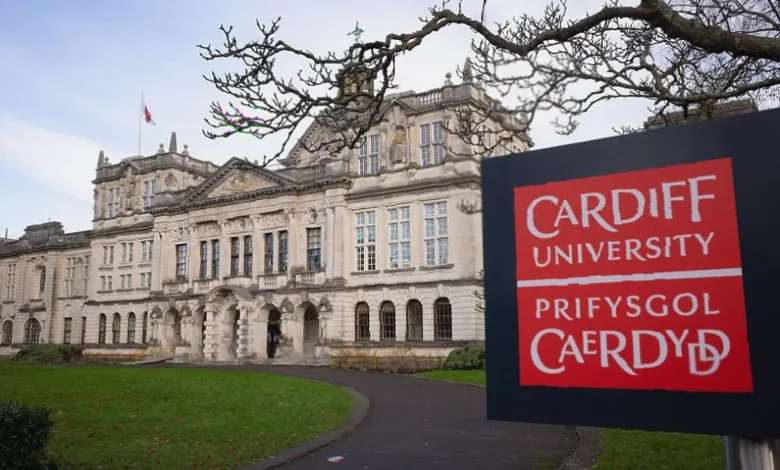 Exterior view of Cardiff University campus buildings on a cloudy day