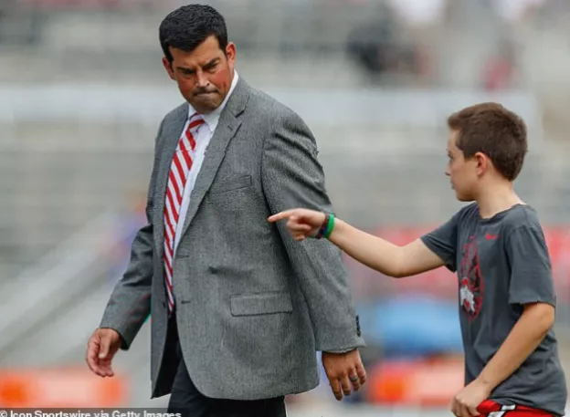 Football coaches Ryan Day and Chip Kelly on the sidelines during an Ohio State game in 2024.