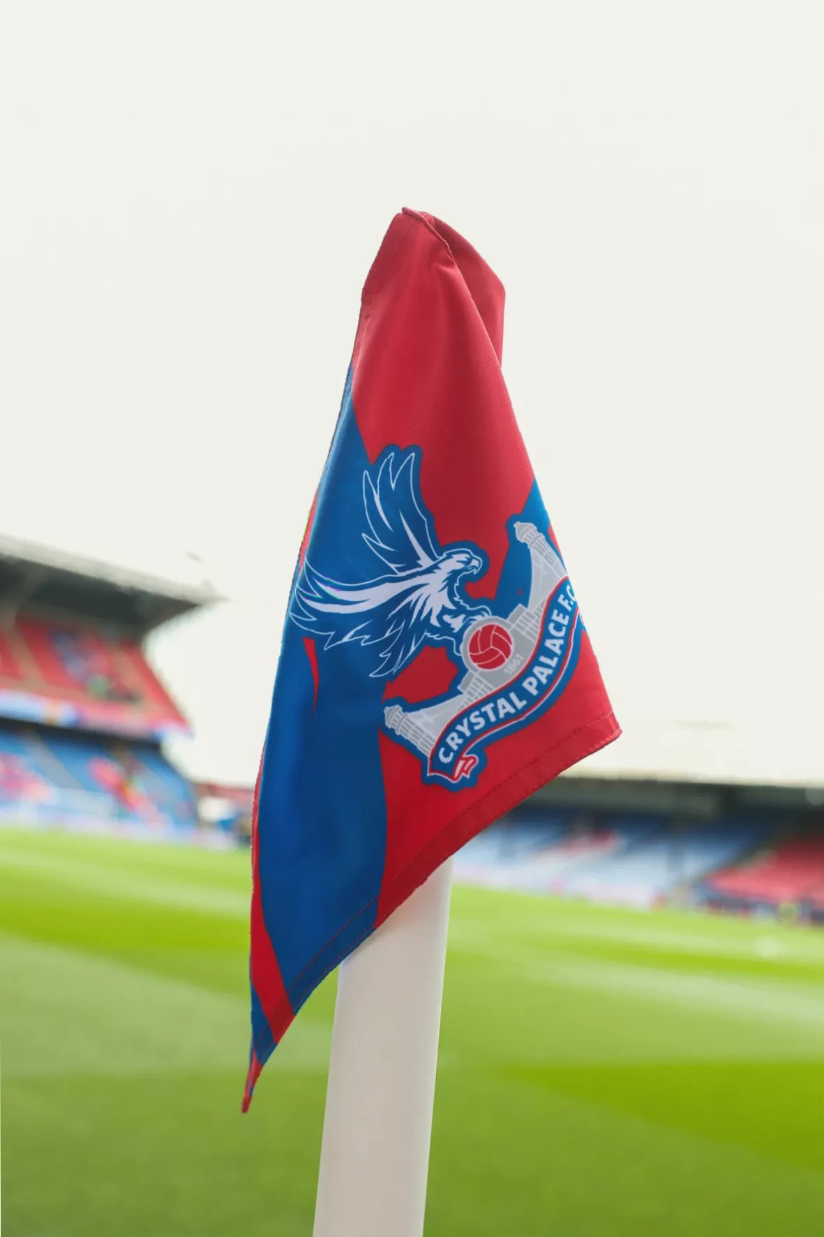 Police officers and sniffer dogs stationed at turnstiles outside Selhurst Park