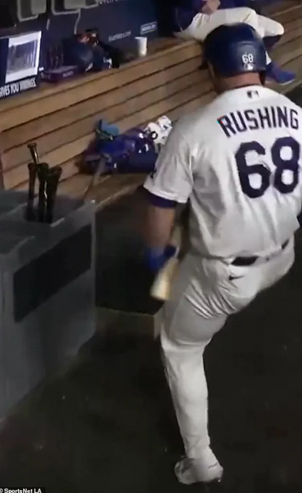 Baseball player hits himself on helmet with new bat in frustration